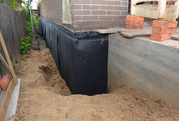 Happy homeowners after waterproofing job in Brinklow